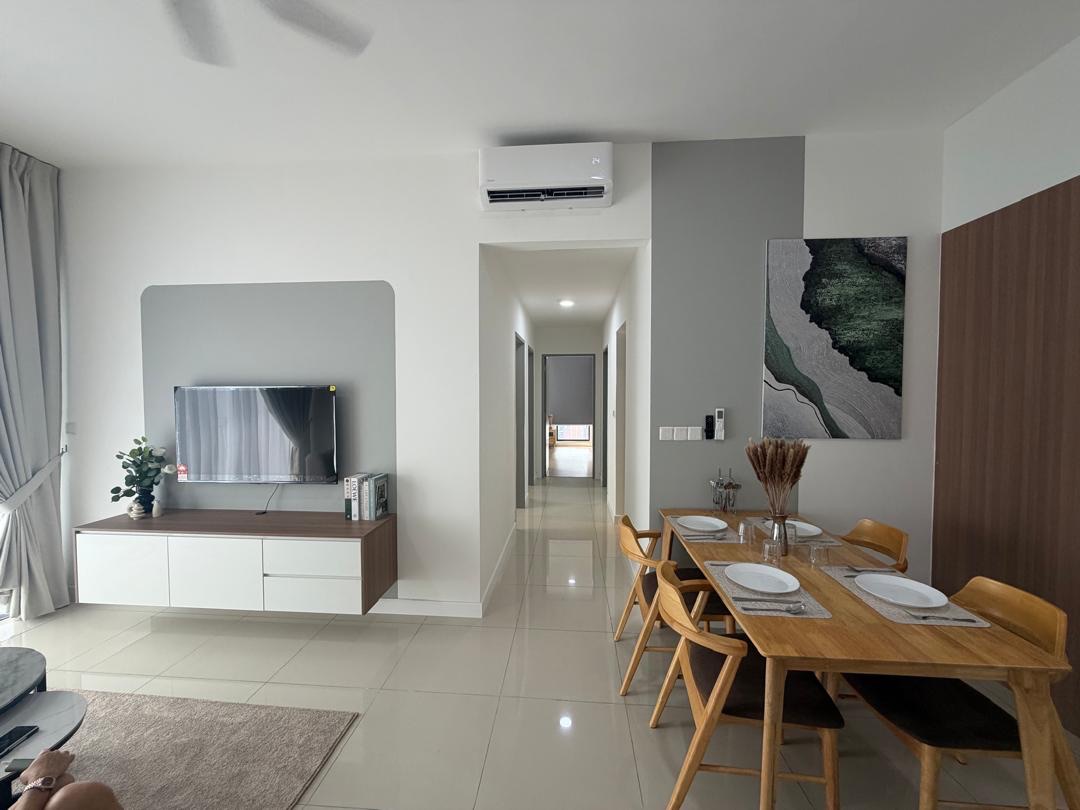 Furnished shared living and dining space in a co-living unit